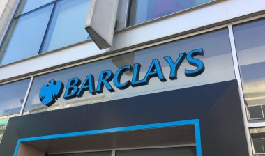 Barclays sign outside building front entrance