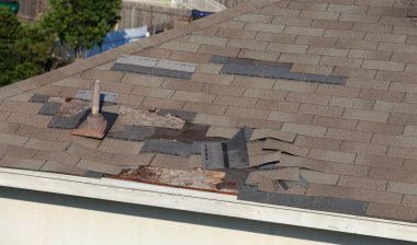 Broken shingles on home representing the CertainTeed settlement.