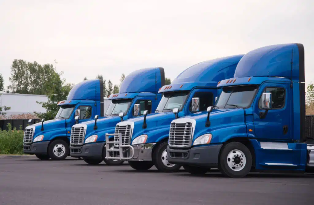 Semi trucks in a row representing the FleetPride BIPA settlement.