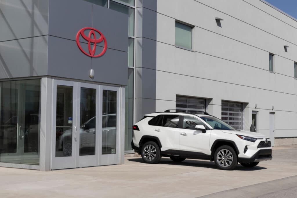 Toyota Rav4 parked outside of a Toyota Dealership