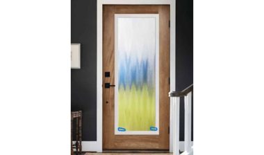 Product photo of recalled door insert by ODL, with circled location of date code.