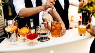 Fruit cocktails being served on a bar table, representing the Parrot Bay mini bottles class action.