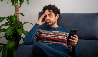 Man upset with texts, This represents the frustration of opting out of receiving annoying spam text messages and still receiving them.