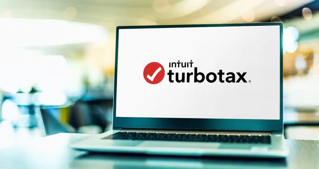 Laptop computer displaying logo of TurboTax, a software package for preparation of American income tax returns, produced by Intuit, representing the TurboTax settlement.