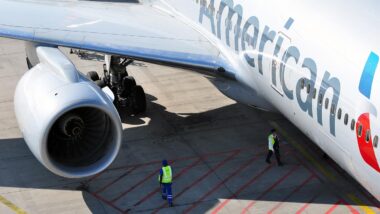 Close up of American Airlines logo on the side plane, representing the proposed Jet Blue and American Airlines merger.