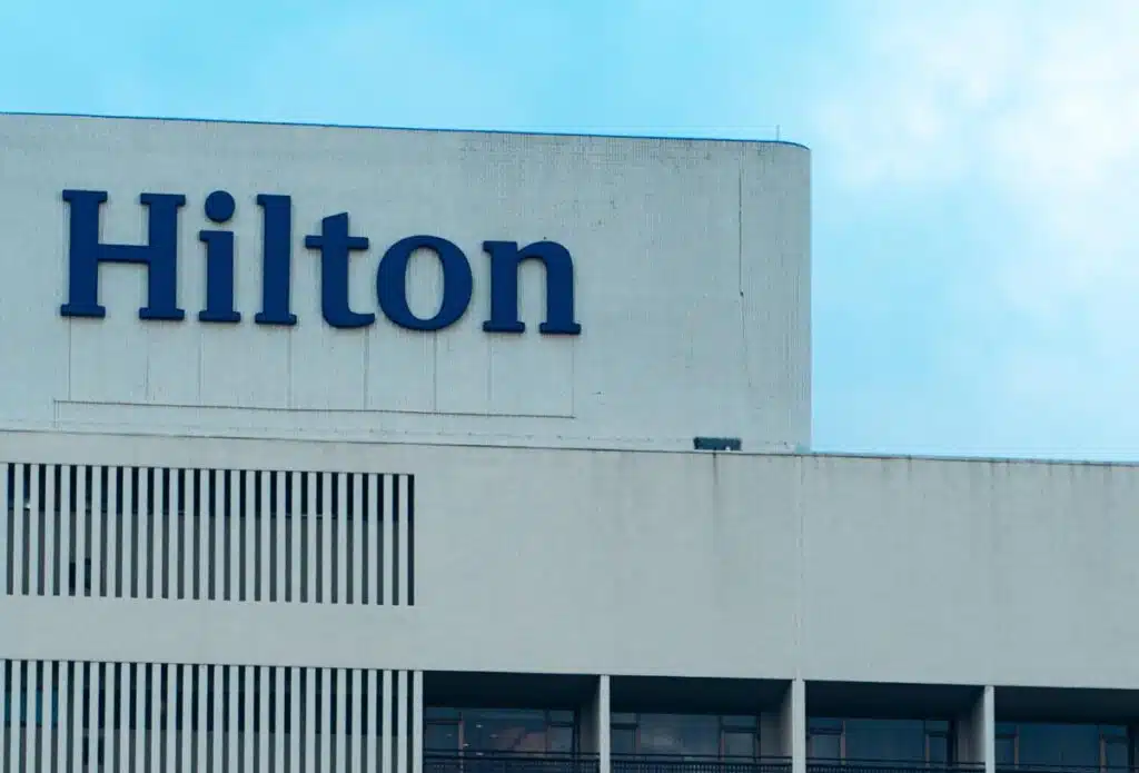 Close up of Hilton signage, representing the Texas Hilton hidden resort fees lawsuit.