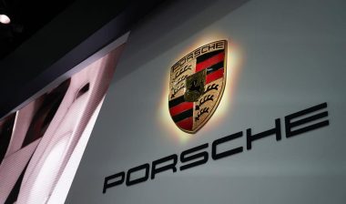 Close up of Porsche signage, representing the Porsche settlement.