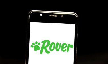 Close up of the Rover logo displayed on a smartphone screen, representing the Rover settlement.