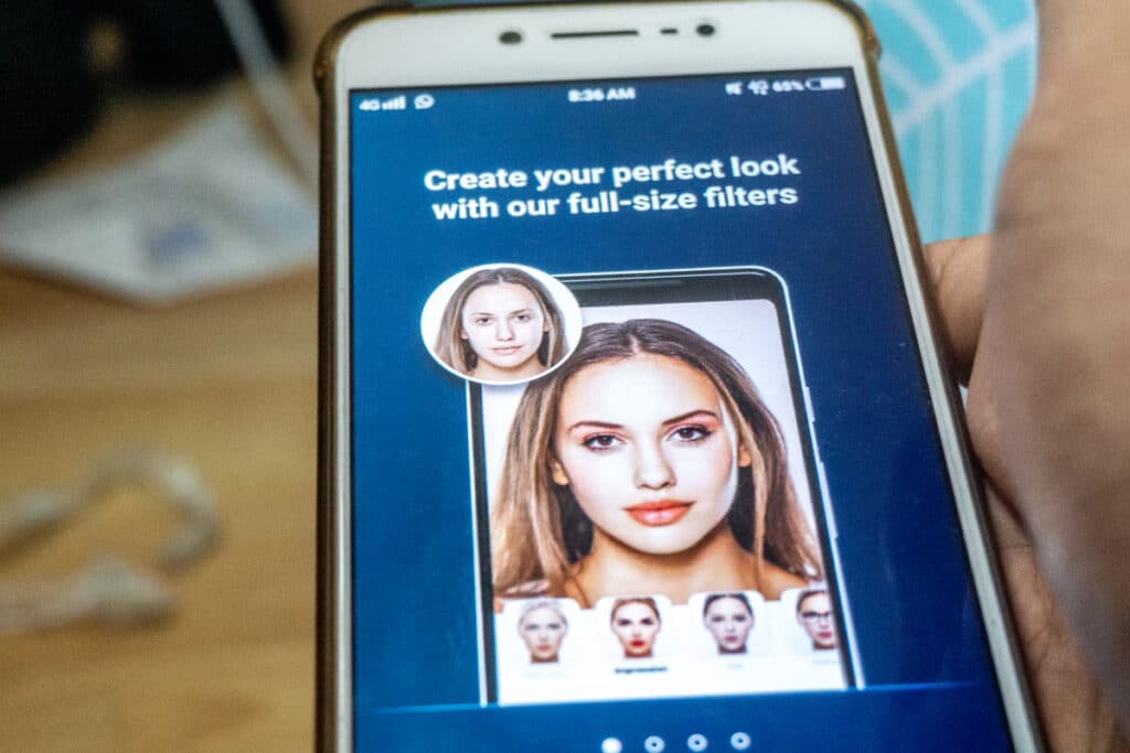 Close up of a deepfake application displayed on a smartphone screen, Representing the Senate artificial intelligence bill.