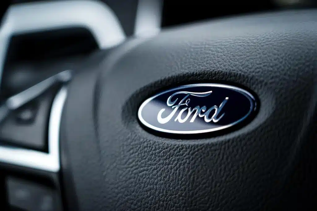 Close up of Ford emblem on a steering wheel, representing the top recalls for the week of June 5.