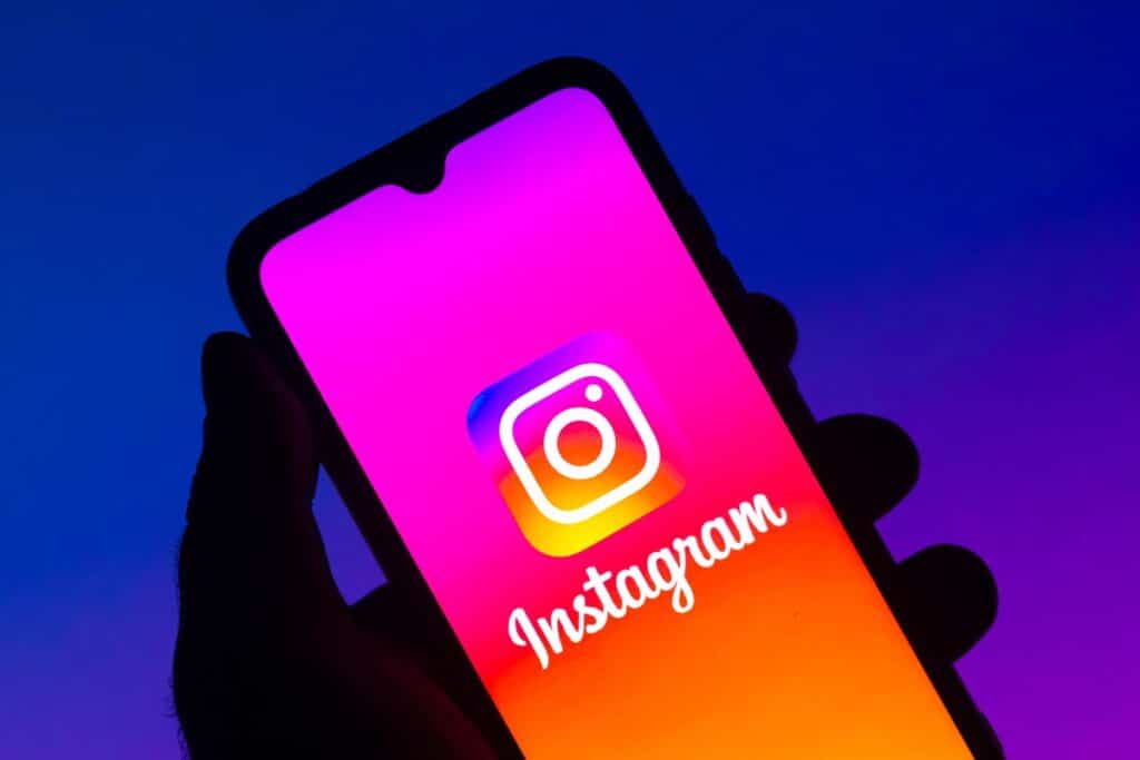 Instagram logo displayed on a smartphone screen, representing the Instagram pedophile algorithm report.