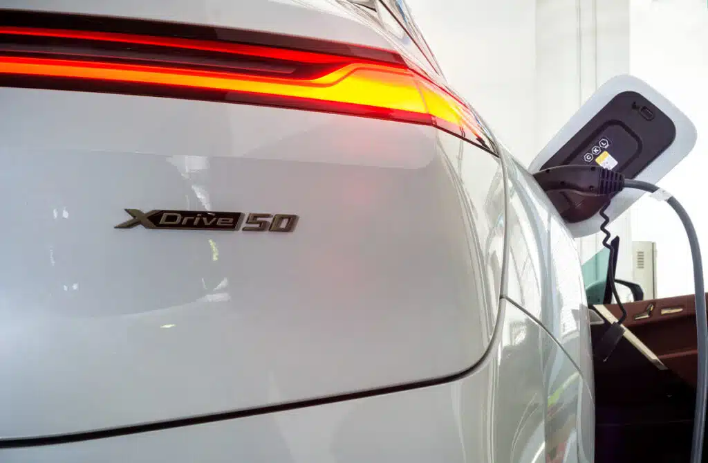 Close up of bumper of white BMW xDrive50, representing the BMW cruise control recall.