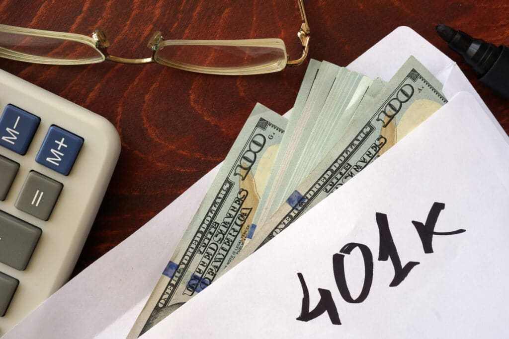 Money in an envelope that reads "401k", representing the Beth Israel Deaconess Medical Center 401(k) class action lawsuit settlement.