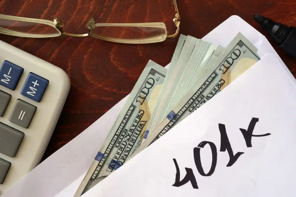 Money in an envelope that reads "401k", representing the Beth Israel Deaconess Medical Center 401(k) class action lawsuit settlement.