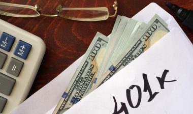 Money in an envelope that reads "401k", representing the Beth Israel Deaconess Medical Center 401(k) settlement.