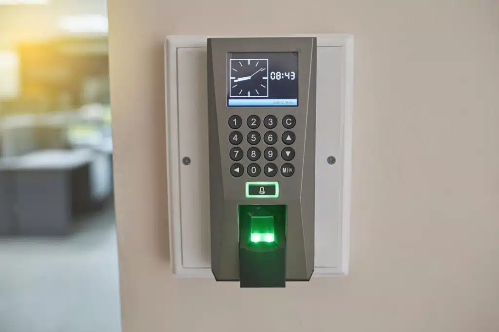 Close up of a biometric time clock, representing the PeopleNet settlement.