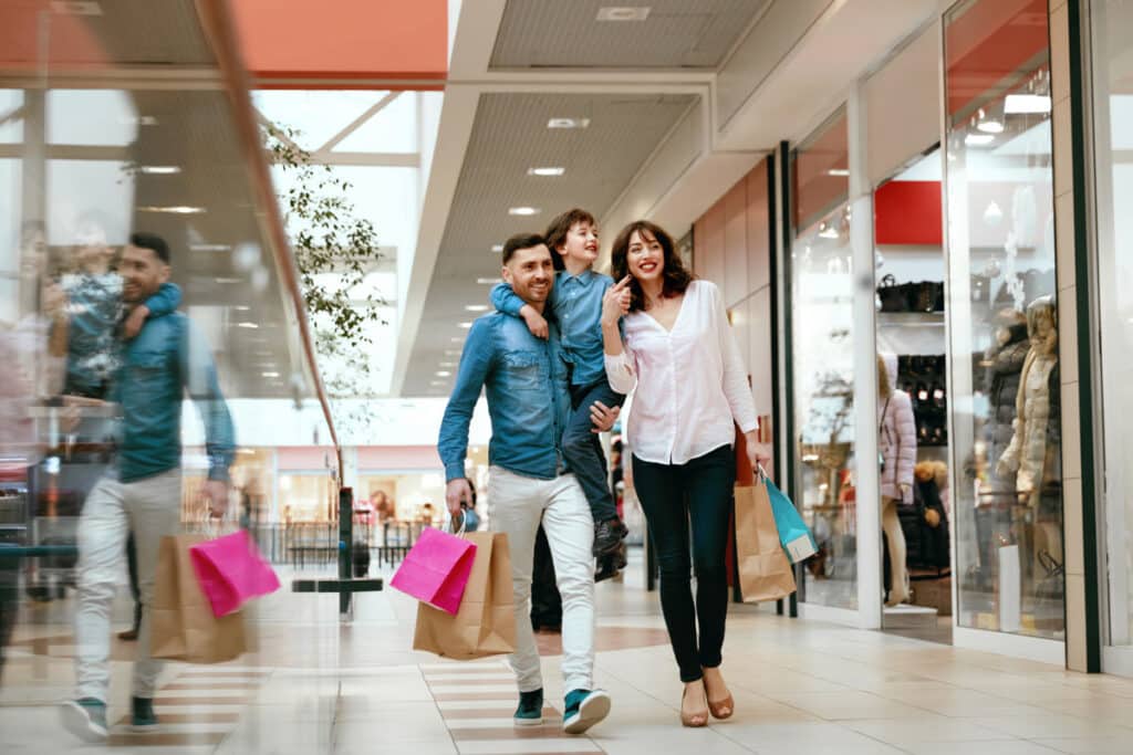 A family shopping inside of a mall, representing top recalls for the week of June 26.