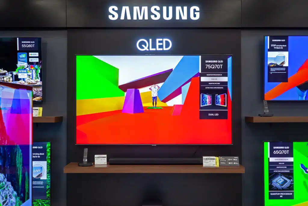 Samsung QLED TV for sale inside a store, representing the Samsung class action.