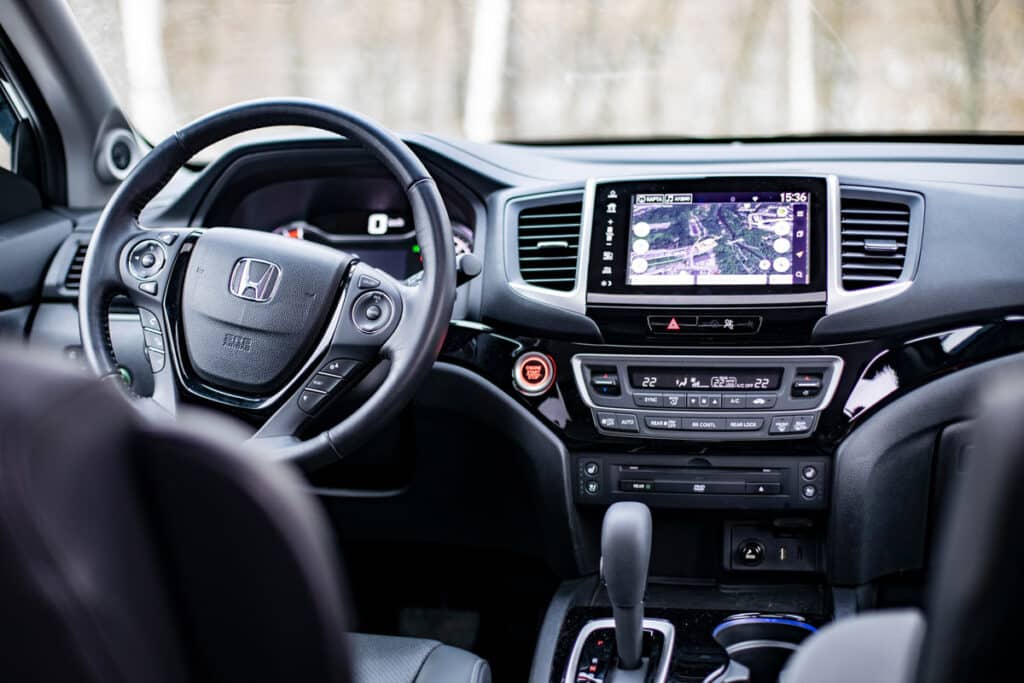 Interior of a Honda Pilot, representing the Honda defects class action.