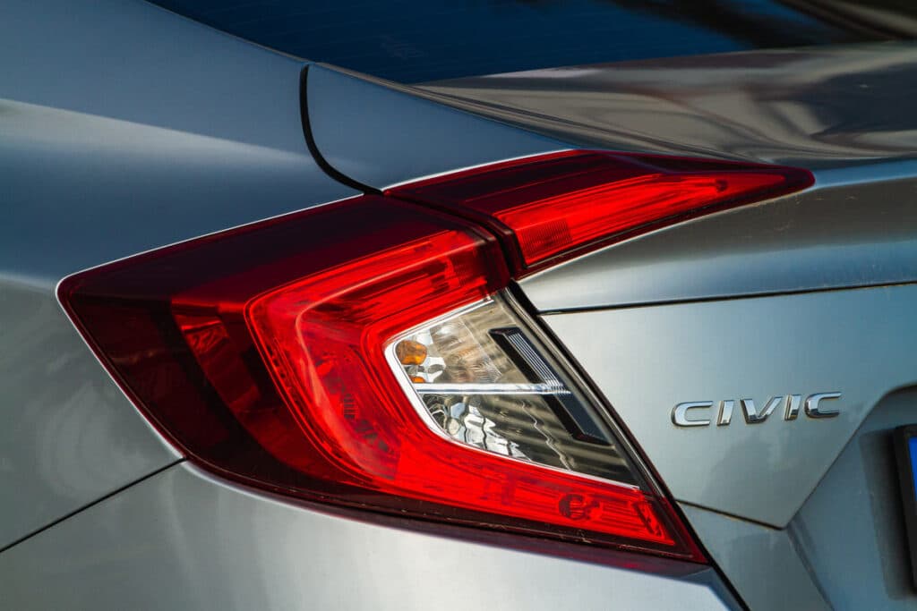 Close up of Honda Civic bumper, representing the Honda brake hold recall.
