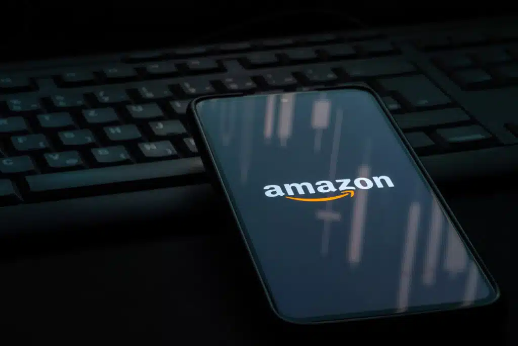 Amazon logo displayed on a smartphone screen, representing Amazon's personalized recalls page.