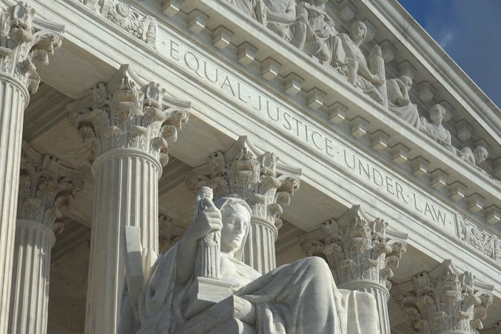 U.S. Supreme Court building entrance, representing the Supreme Court ethics bill.