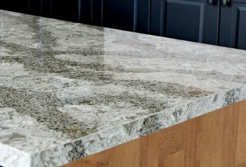 Quartz stone countertop in kitchen, Quartz countertop silicosis occurs after workers are exposed to years of silica dust generated from cutting and sanding stone countertops.