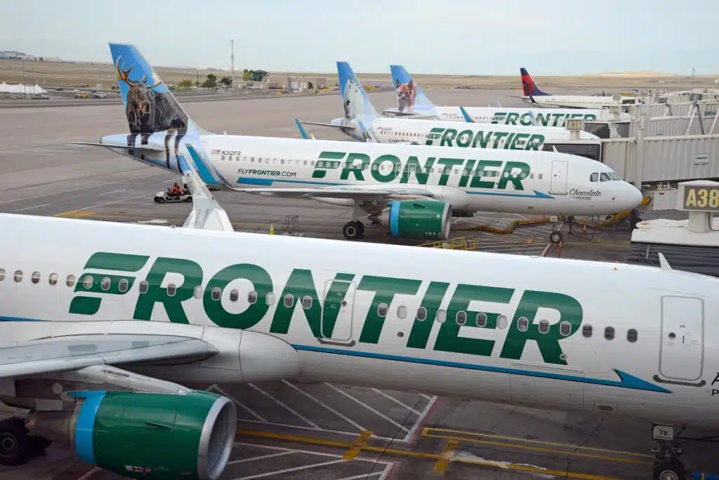 Frontier planes at an airport, representing the Frontier Airlines class action.