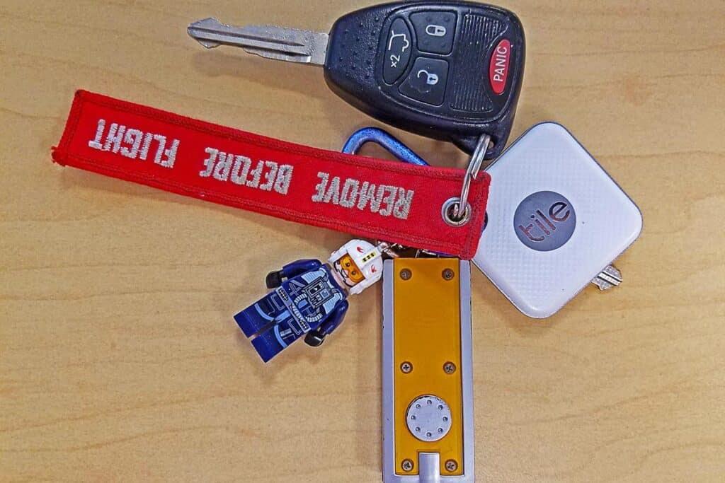Tile tracker on a keychain, representing the Amazon Tile class action.
