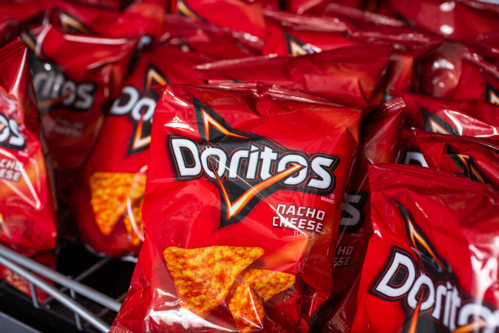 Close up of Doritos Nacho Cheese bags, representing the Doritos allergy recall.