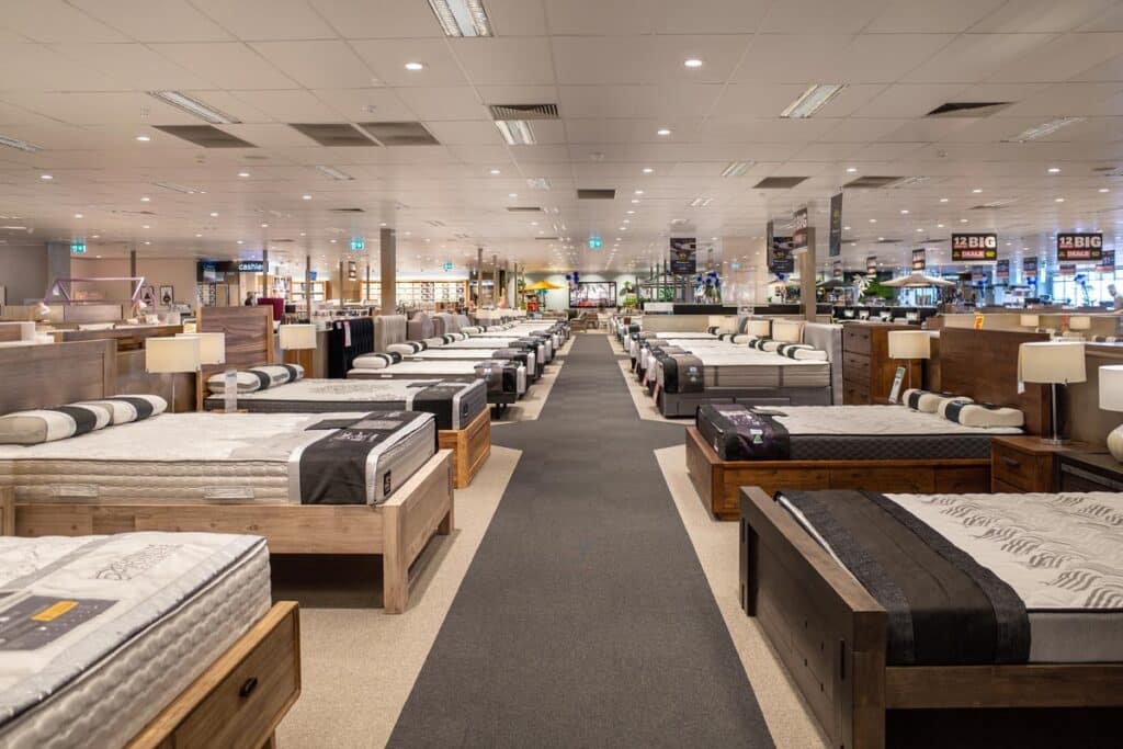 Inside a mattress store, representing the mattress class actions.