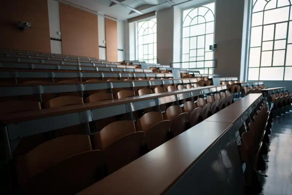 Inside a university classroom, representing the University of New Haven settlement.
