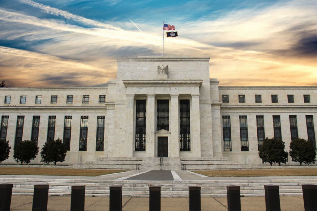 Exterior of the U.S. Federal Reserve building, representing bank lending requirements.
