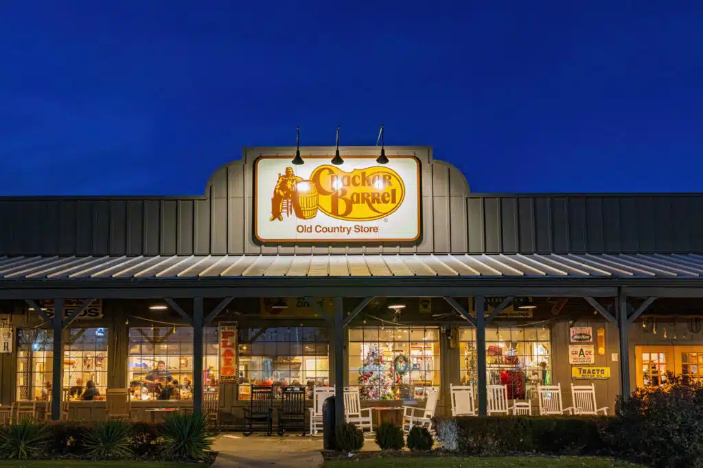 Exterior of a Cracker Barrel restaurant at night, representing the Cracker Barrel lawsuit.