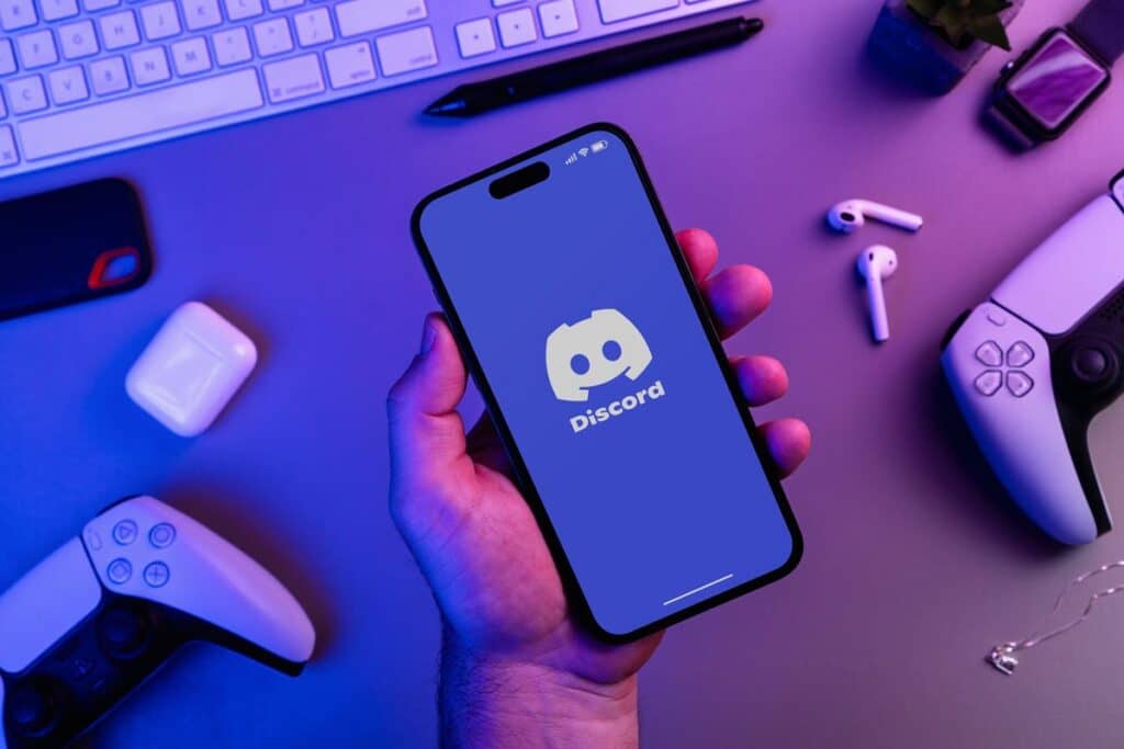 Discord logo displayed on a smartphone screen, representing the discord data breach.