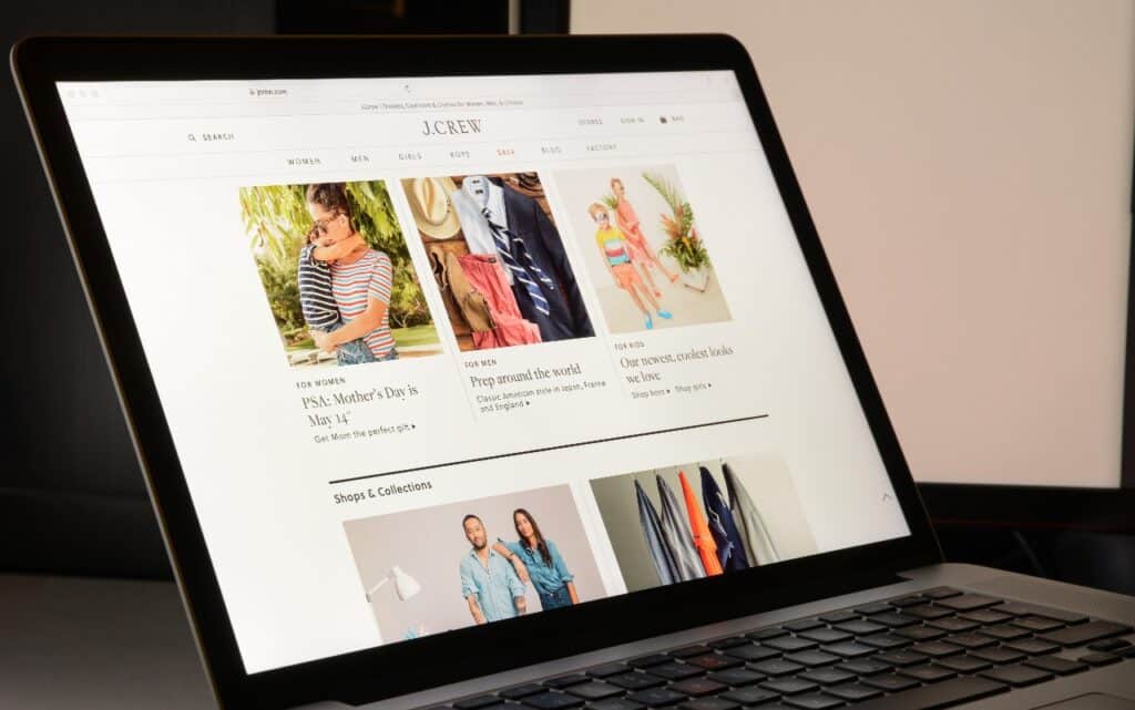 J. Crew website displayed on apple laptop