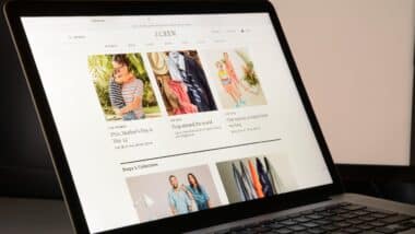 J. Crew website displayed on apple laptop