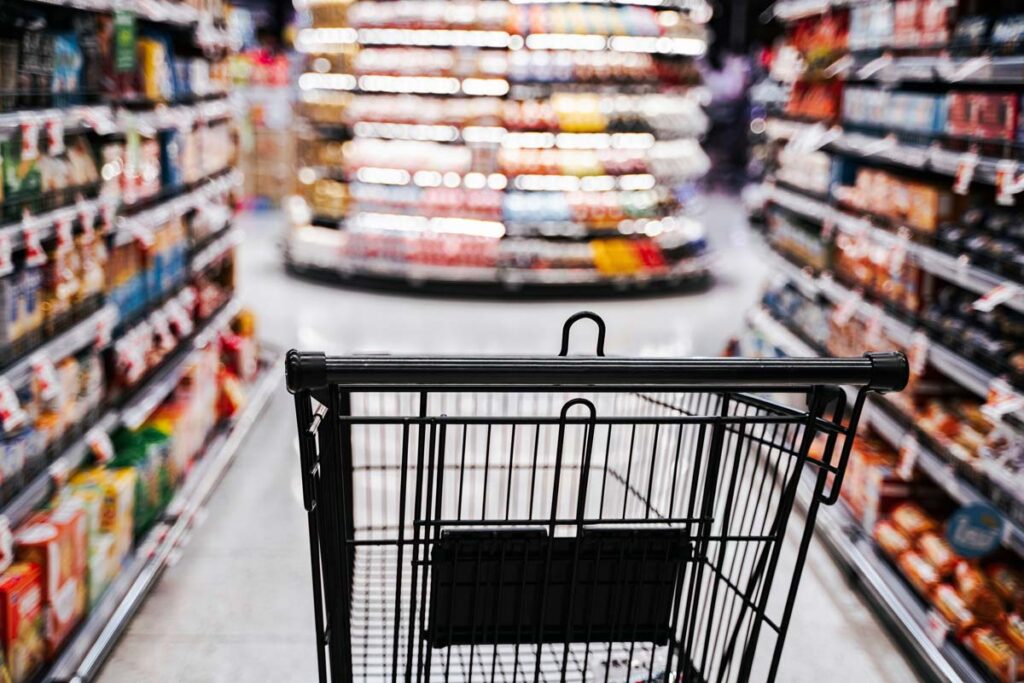 Close up of a shopping cart in a store, representing top recalls for the week of Sept. 18.