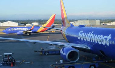 Southwest planes at an airport terminal, representing the Southwest COVID-19 cancellations class action lawsuit.