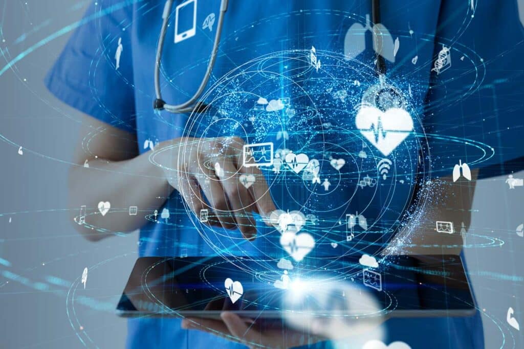 Close up of a nurse holding a tablet with a data concept overlay, representing the Marietta Health settlement.