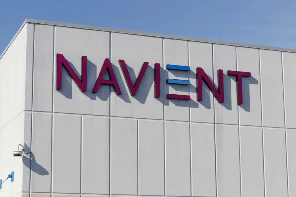Close up of Navient signage on a building, representing the Navient bankruptcy class action lawsuit settlement.