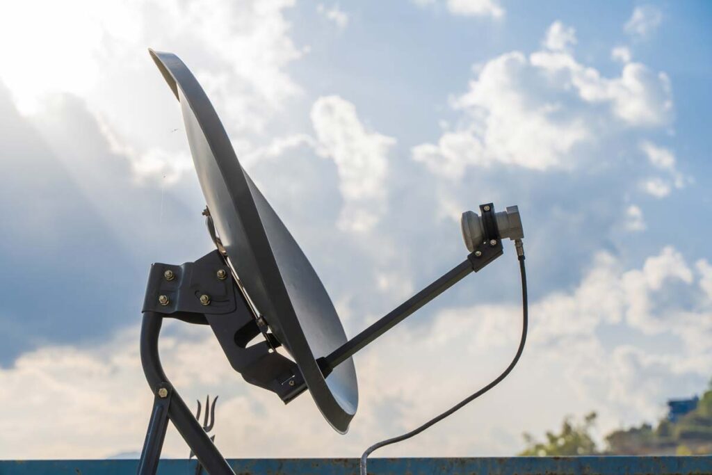 Close up of a residential satellite dish, representing the potential cable and satellite rebates.