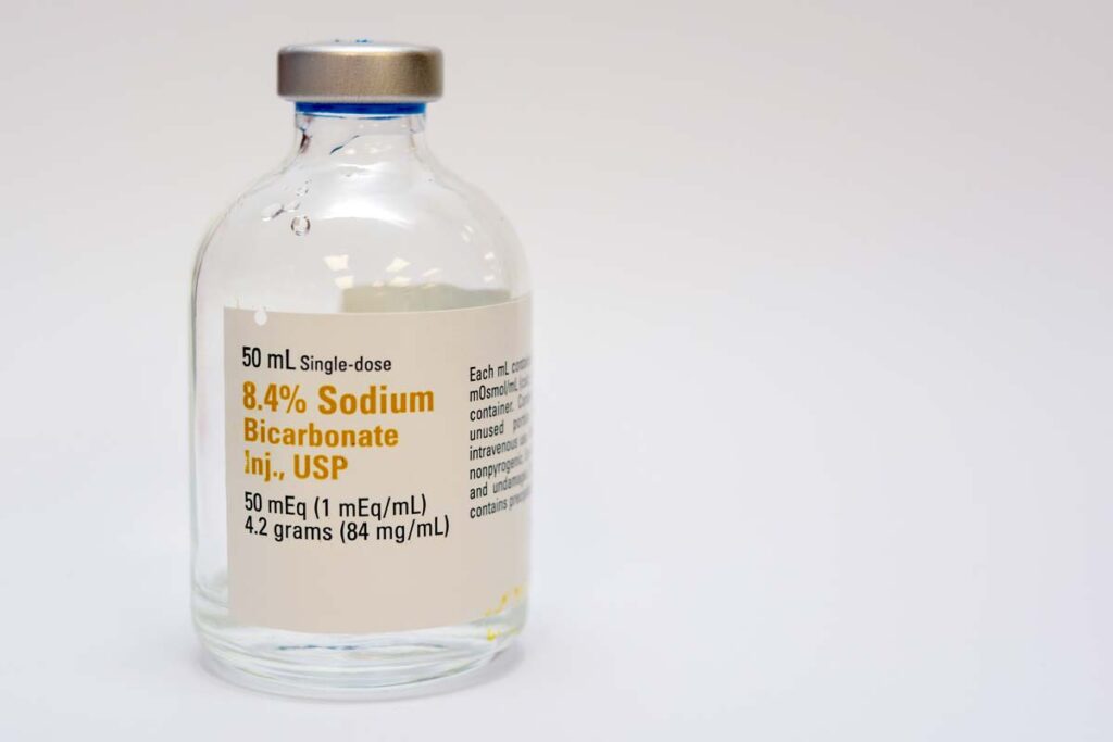 Close up of a Sodium Bicarbonate vial, representing the sodium bicarbonate and lidocaine HCl recall.