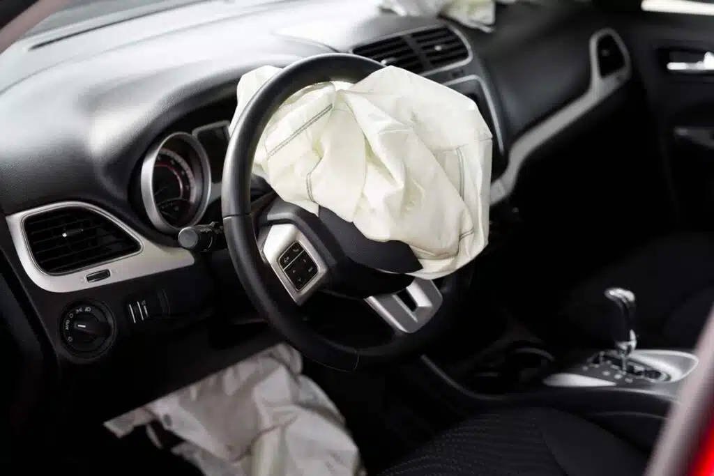 Close up of deflated airbag in vehicle, representing the air bag inflator recall recommendation.