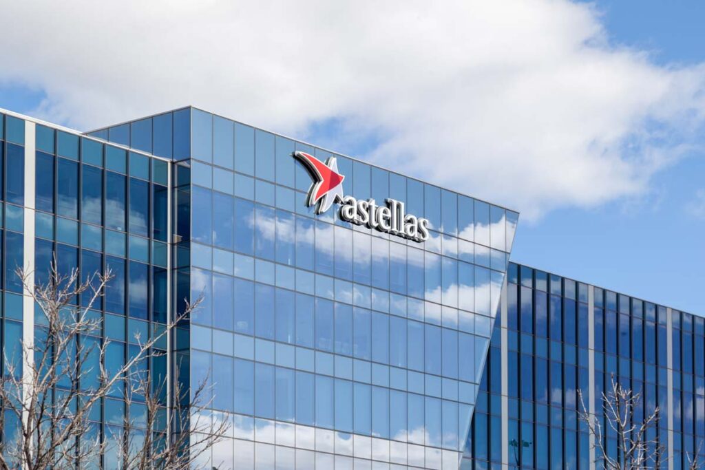 Close up of Astellas signage on a building, representing the Astellas 401(k) settlement.