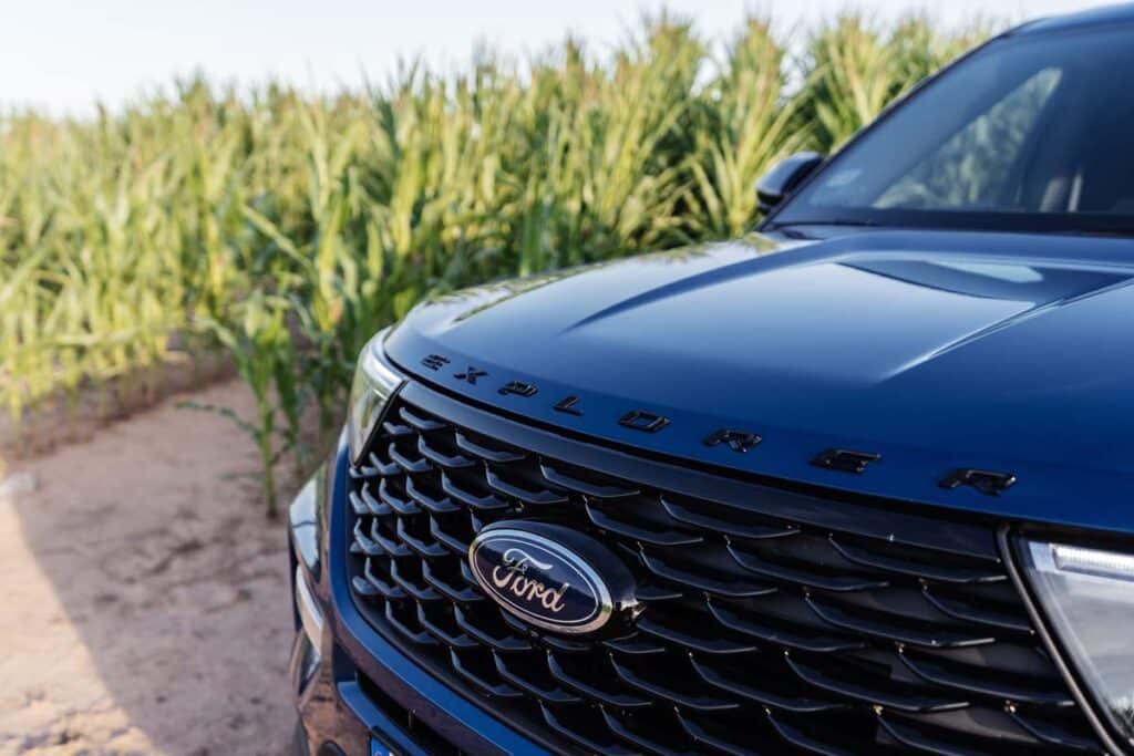 Close up of a bumper of a blue Ford Explorer, representing the Ford Explorer recall.