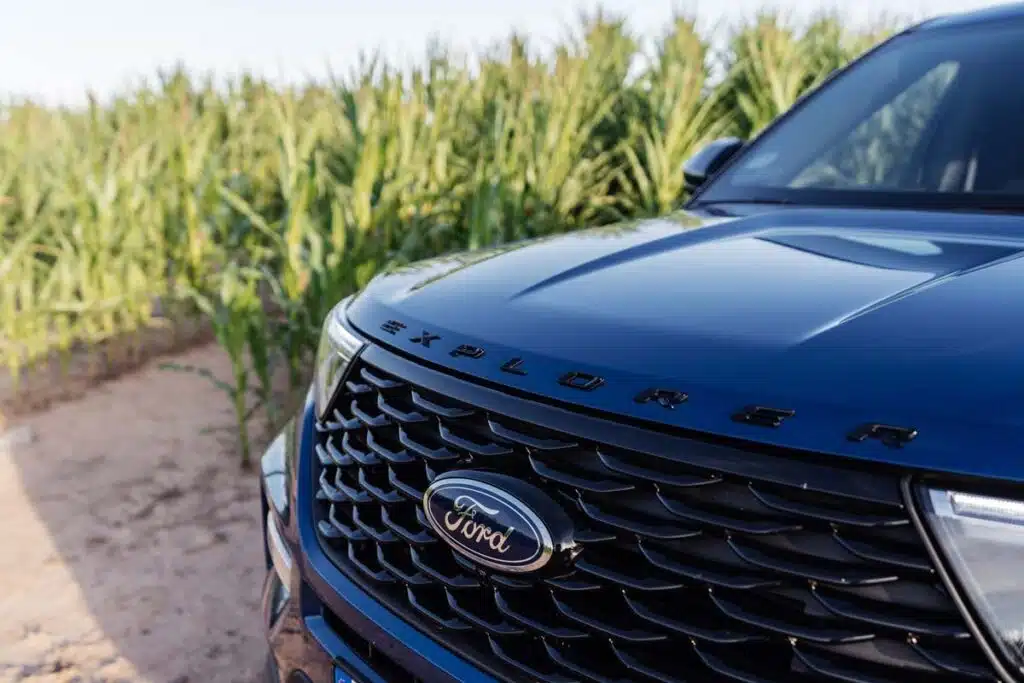 Close up of a bumper of a blue Ford Explorer, representing the Ford Explorer recall.