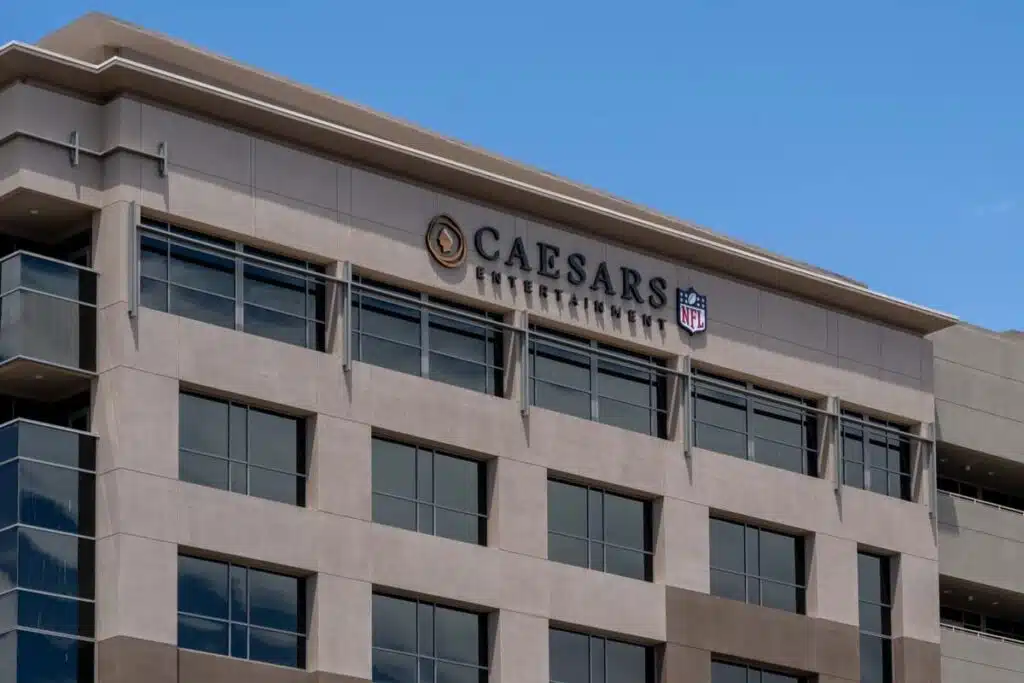Close up of Caesars Entertainment signage on a building, representing the Caesars data breach class action lawsuit.