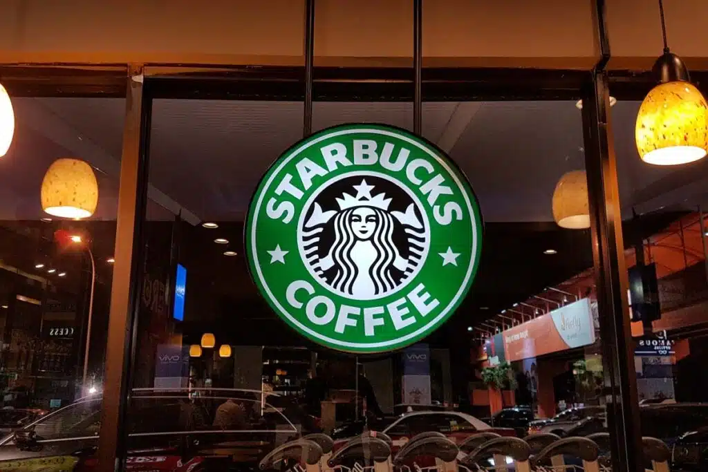 Close up of Starbucks Coffee signage, representing the Starbucks union lawsuit.