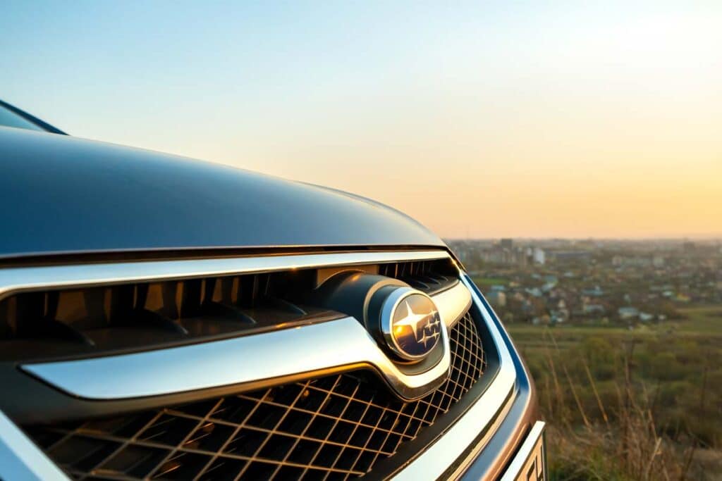 Close up of a front bumper of a Subaru, representing the Subaru recall.